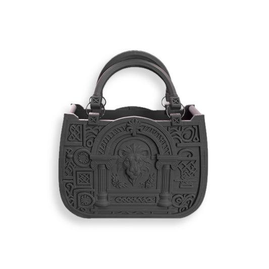 The JUSTICE&POWER 3D-printed handbag features a neoclassical design with ornate embossed patterns, a central ram’s head motif, two sturdy handles, and intricate architectural detailing.